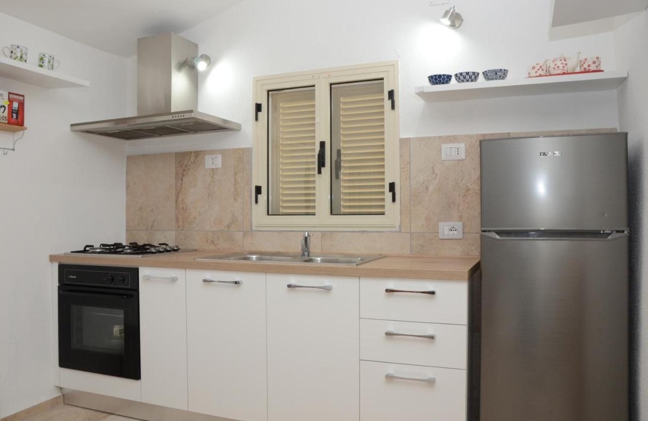 Apartments Villa Corrias Cala Liberotto Exterior foto